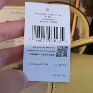 Yellow envelope Kate Spade bag. NWT perfect condition. Bought and never used